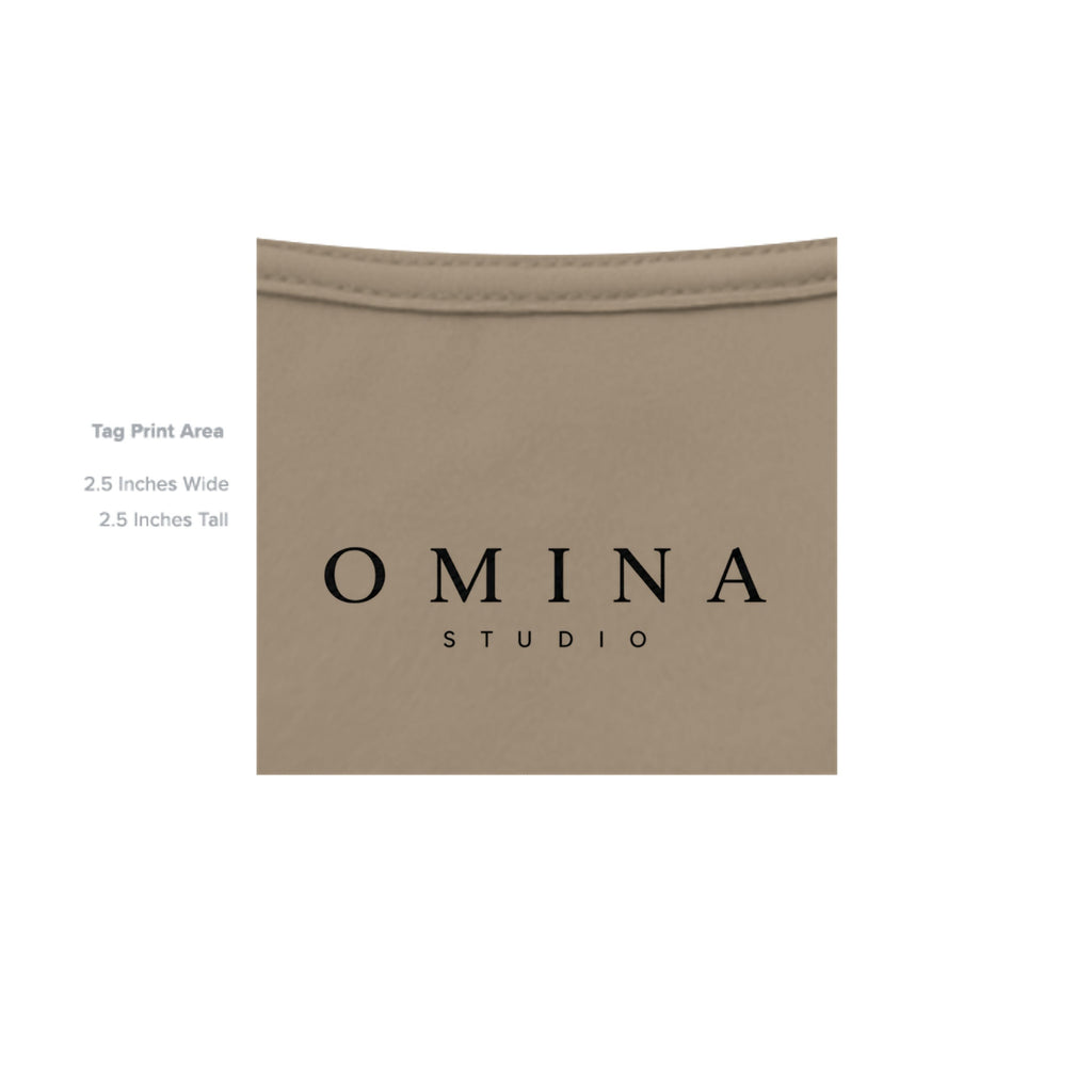 OMINA Studio heavyweight cotton tee in a neutral taupe color with a vintage-inspired graphic.