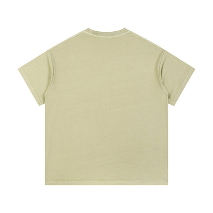 Omina Studio light green vintage wash 100% cotton unisex t-shirt with short sleeves and round neck.