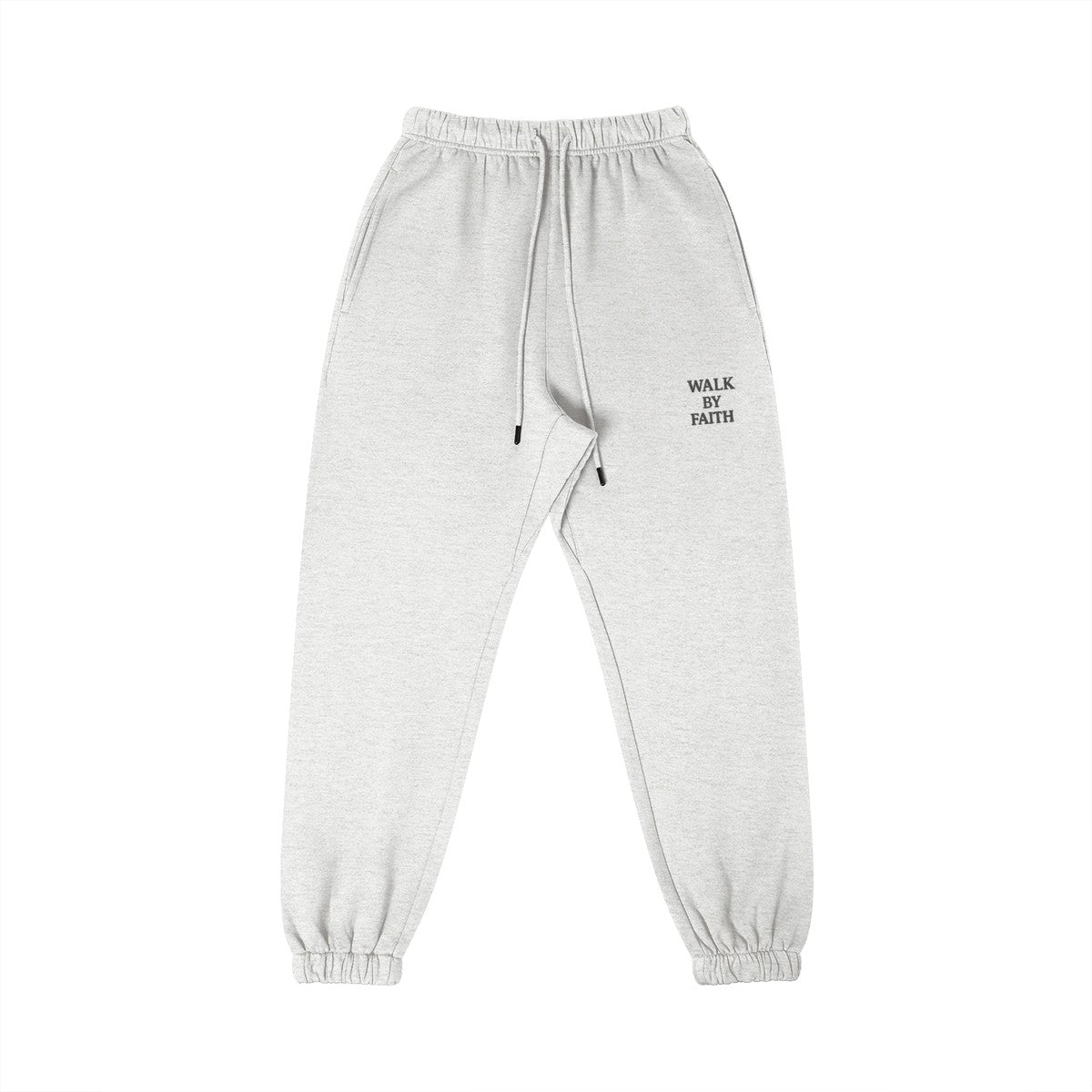 Omina Studio light grey cotton sweatpants with "Walk By Faith" text detail on the right thigh. Elastic waistband and cuffs.