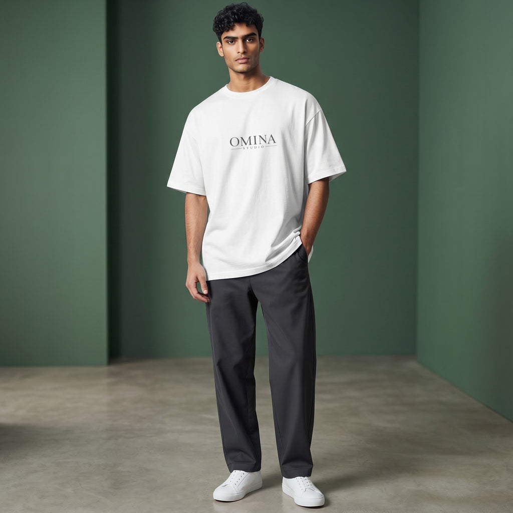 Omina Studio white 100% cotton oversized fit crew neck t-shirt with drop shoulders and minimalist logo.