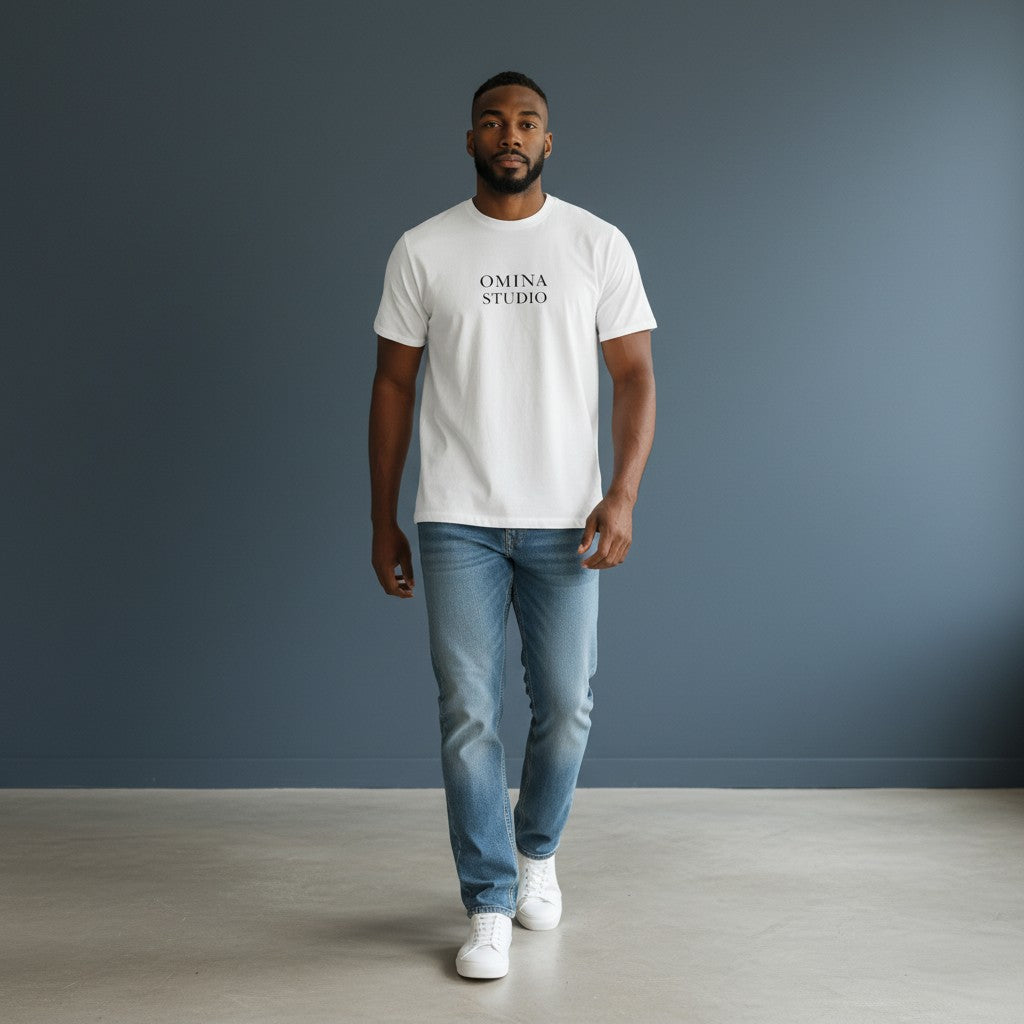 OMINA Studio white heavyweight cotton t-shirt with drop shoulders and crew neck, worn by a man.
