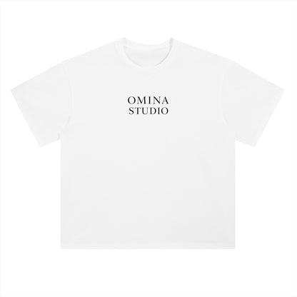 OMINA Studio white heavyweight cotton t-shirt with drop shoulders and crew neck, featuring a small black logo on the chest.
