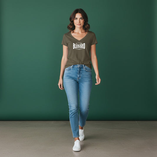 Woman wearing an Omina olive green Tencel slim fit V-neck T-shirt with Blessed graphic, paired with blue jeans.