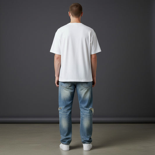 OMINA Vintage Wash Distressed Denim Jeans - Light blue wash, relaxed fit, distressed detailing, and ripped hems.