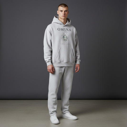 Omina Studio light grey vintage wash oversized hoodie with fleece interior and graphic print of a woman's face.
