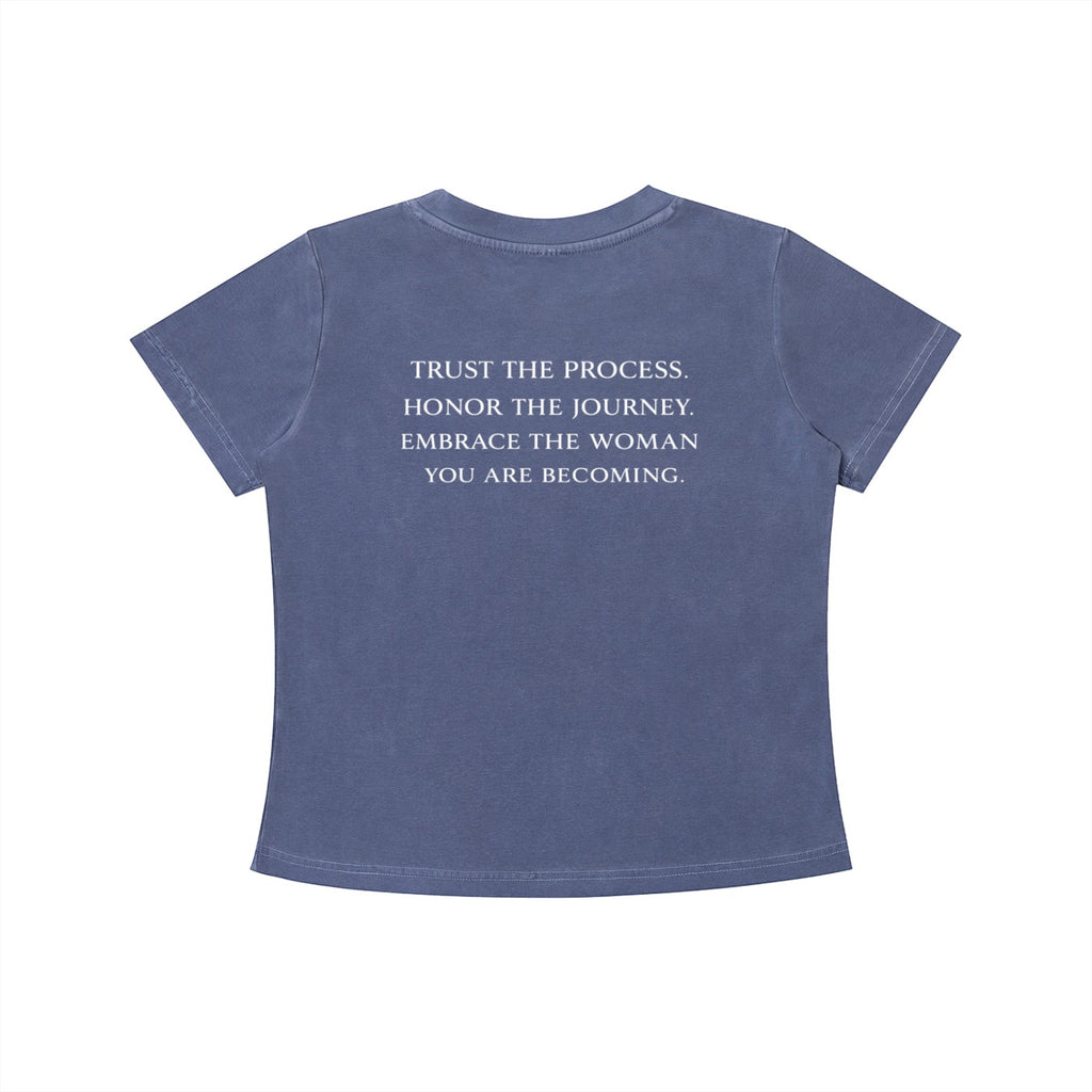 OMINA Essentials blue cotton t-shirt with vintage wash and white text reading "TRUST THE PROCESS. HONOR THE JOURNEY. EMBRACE THE WOMAN YOU ARE BECOMING."