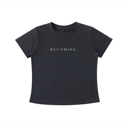 OMINA Essentials dark grey cotton t-shirt with "BECOMING." printed in white. Vintage wash, slim fit.