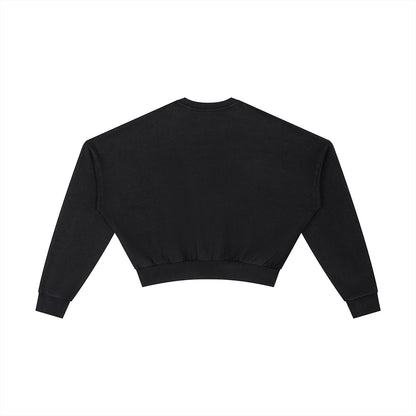 OMINA Studio black vintage washed cropped sweatshirt with drop shoulders and ribbed cuffs/hem. Heavyweight cotton blend.