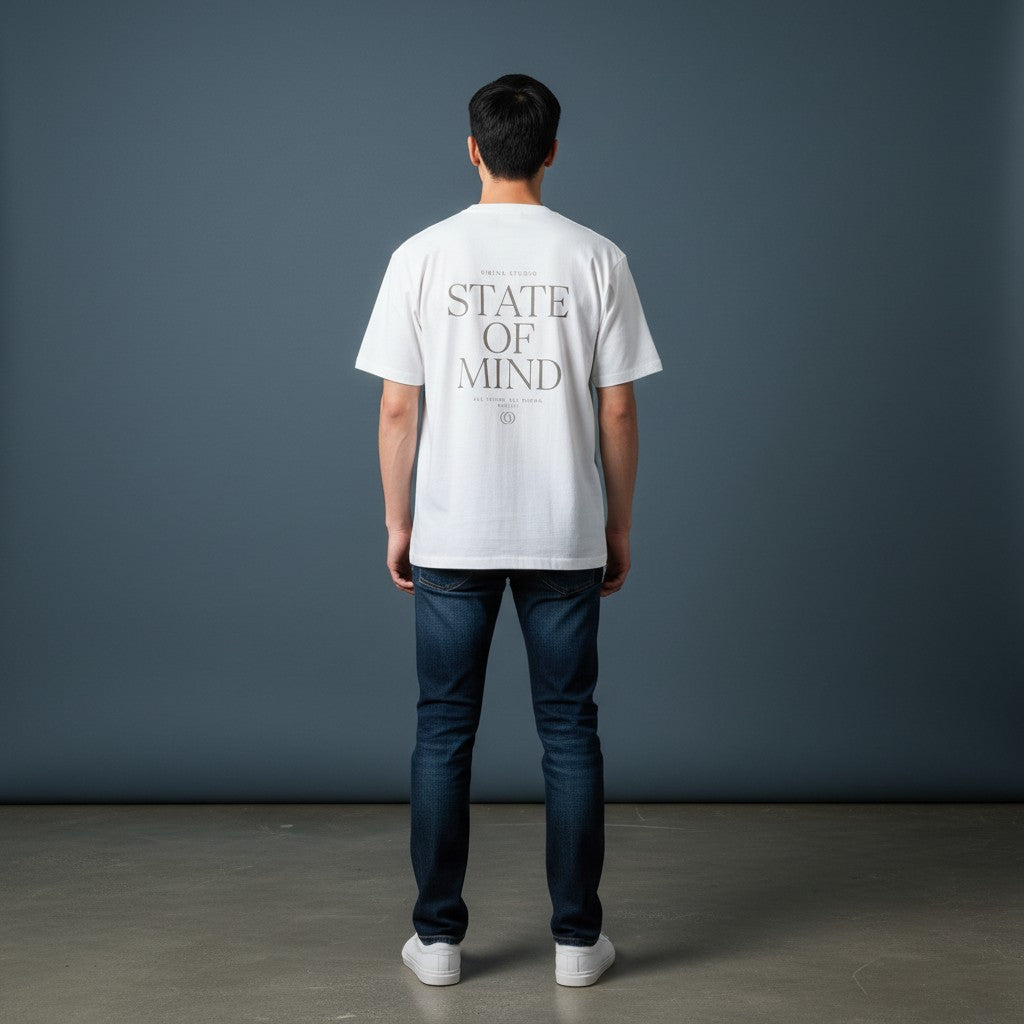 Omina Studio white cotton blend t-shirt with "STATE OF MIND" graphic print on back.
