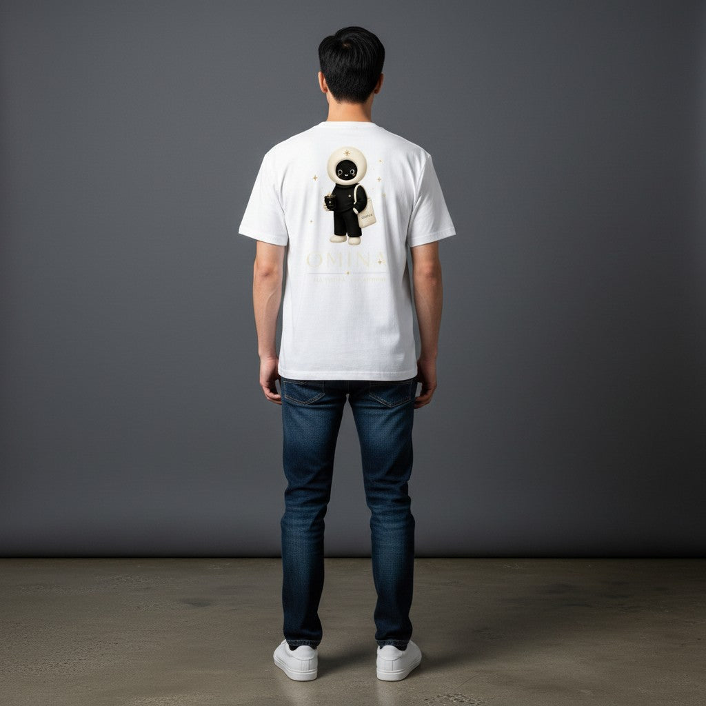 Back view of a man wearing a white Omina cotton t-shirt featuring the O mascot graphic and Omina Studio branding.
