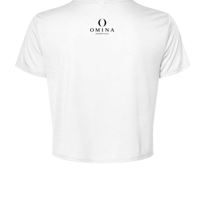 Back view of Omina white cropped tee with Omina Essentials logo printed on the upper back