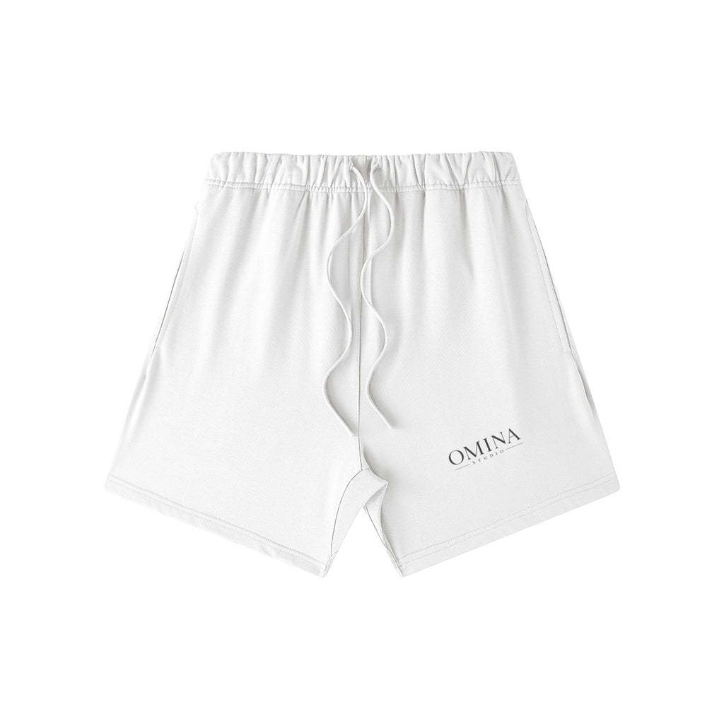 Omina Studio white heavyweight French terry shorts with drawstring and subtle logo detail. Relaxed fit for everyday comfort.