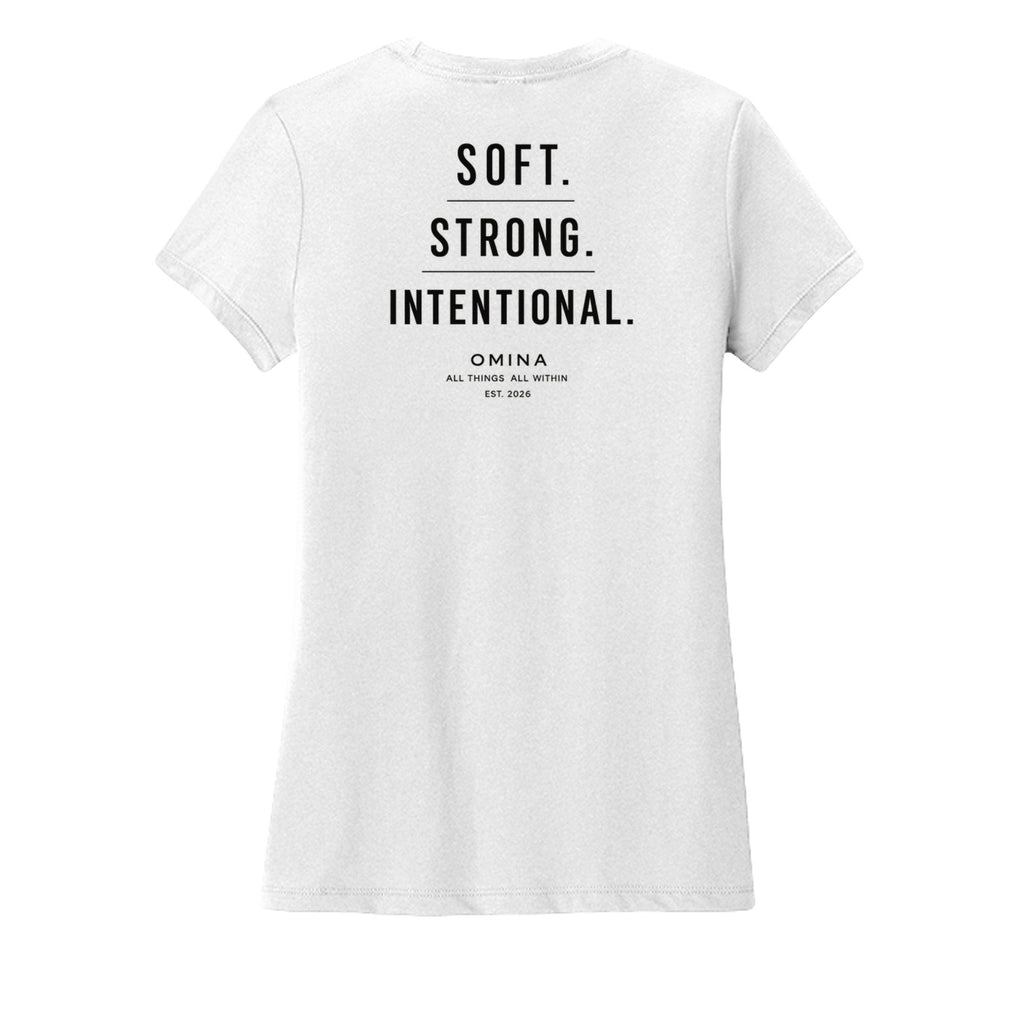 Omina white cotton t-shirt with black text reading SOFT. STRONG. INTENTIONAL. OMINA ALL THINGS ALL WITHIN EST. 2026.