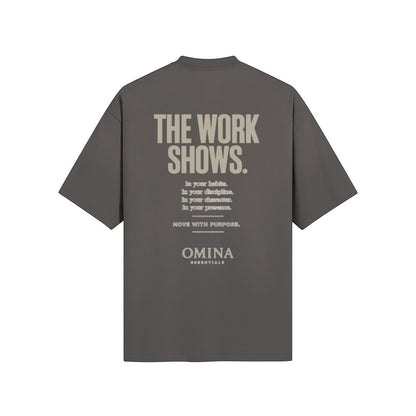 Omina grey cotton t-shirt with 'The Work Shows' graphic print on back. Minimalist design.