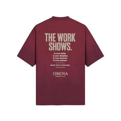 Omina burgundy cotton t-shirt with "The Work Shows" graphic print on back. Minimalist design.