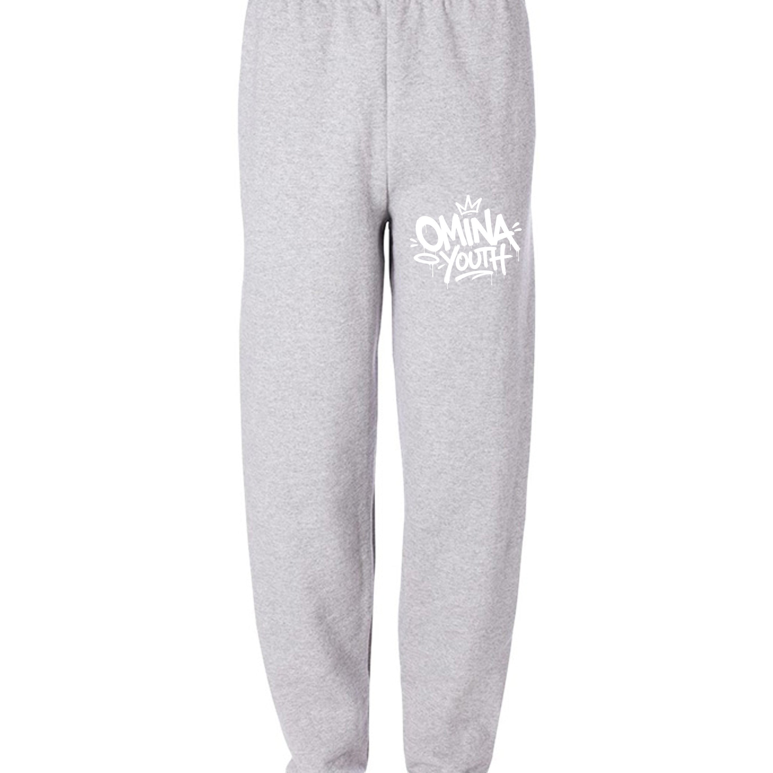 Omina Youth grey sweatpants with relaxed fit and white logo graphic on left thigh. Made from soft premium fabric.