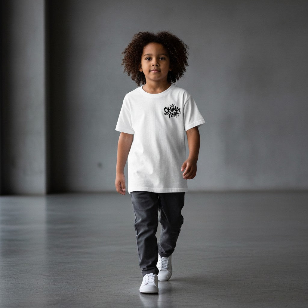 Omina Youth white 100% cotton t-shirt with black graffiti-style logo on left chest. Relaxed fit, crew neck.